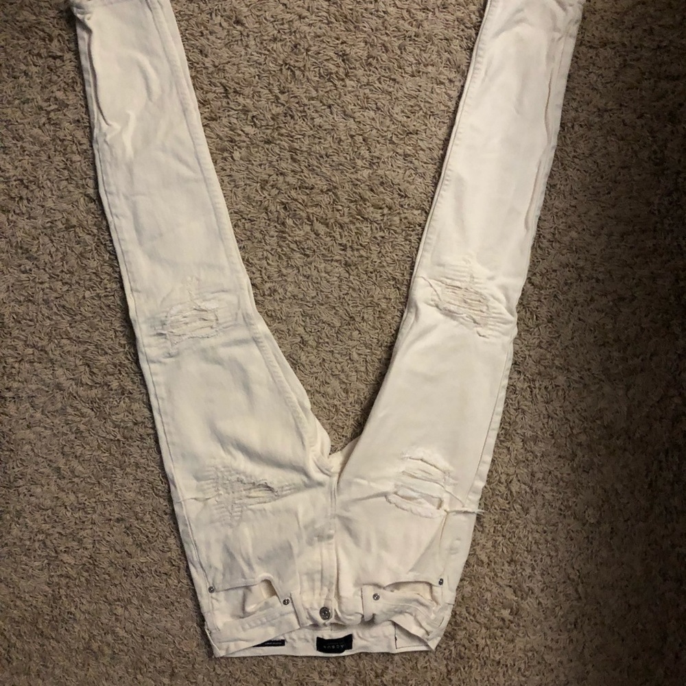 White/cream ripped jeans